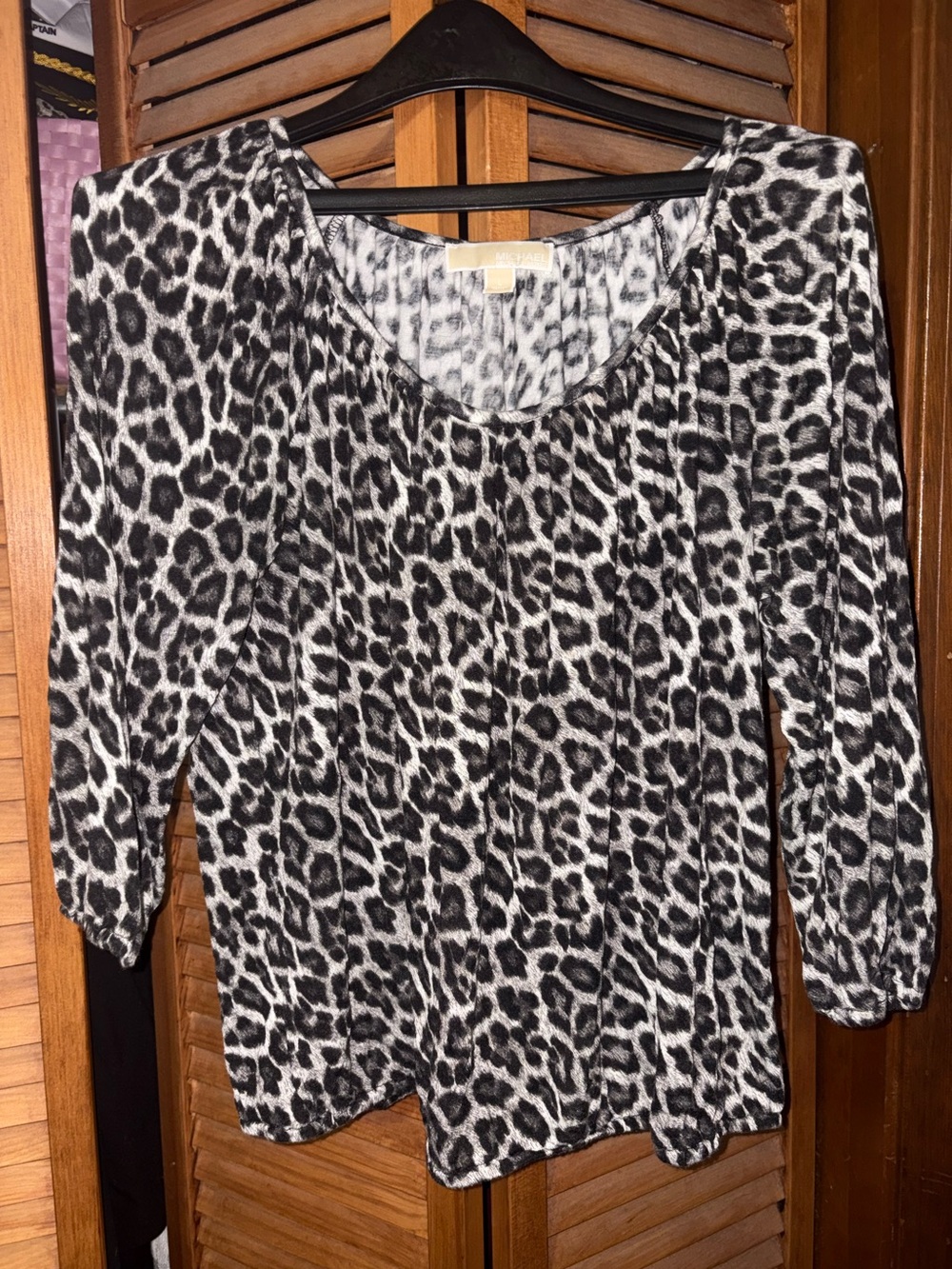 Michael Kors leopard shirt.